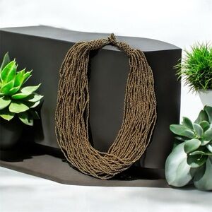 MULTI STRAND BEADED BRONZE WOMANS  NECKLACE. HANDMADE